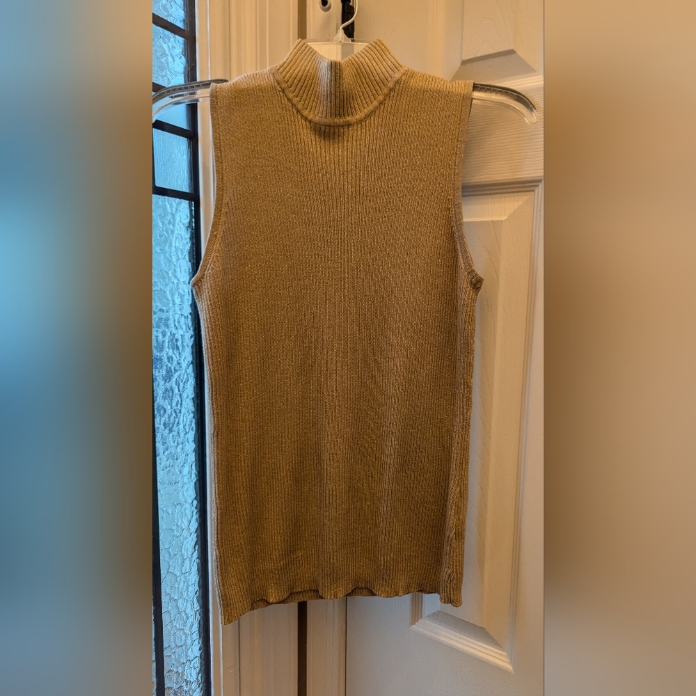Dana Bachman Golden flecks weaved within this sleeveless holiday turtleneck